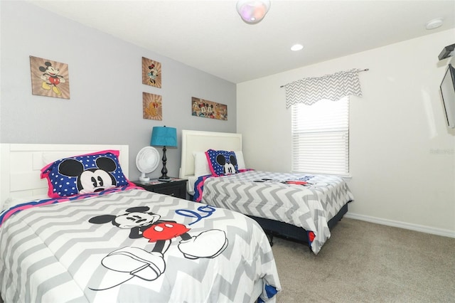 bedroom featuring light carpet