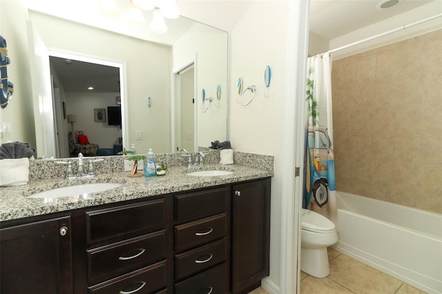 full bathroom featuring vanity, toilet, tile patterned floors, and shower / bathtub combination with curtain