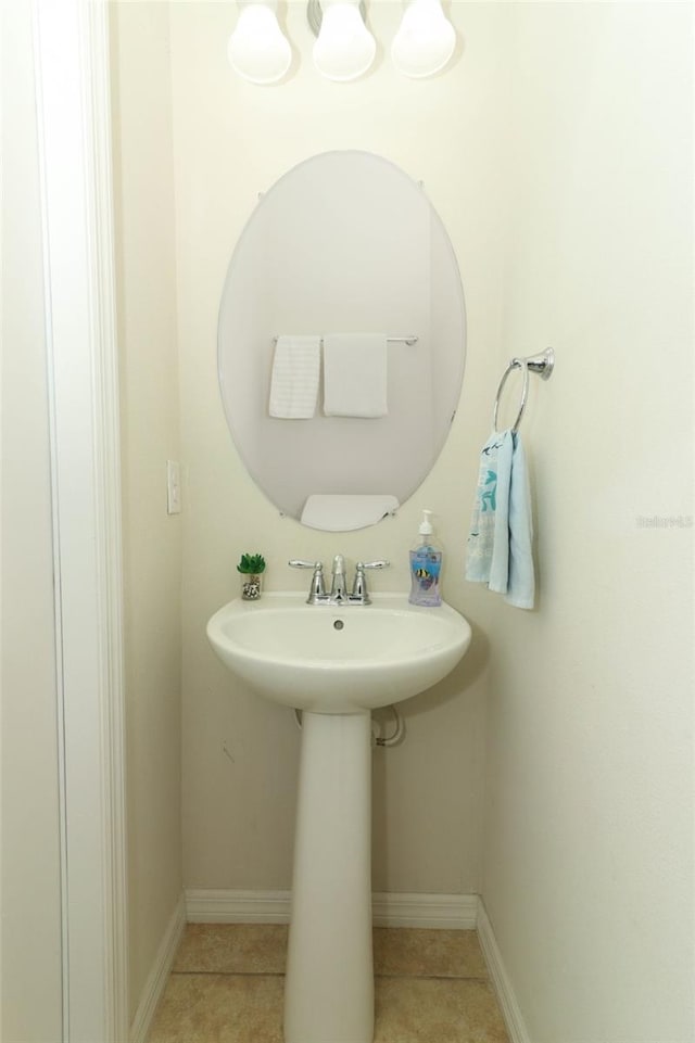 bathroom with sink and tile patterned floors