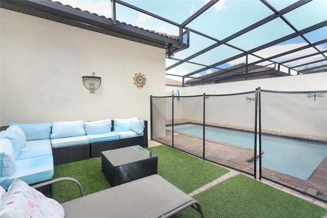 view of swimming pool with glass enclosure, a patio area, and outdoor lounge area