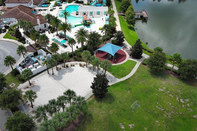 birds eye view of property with a water view