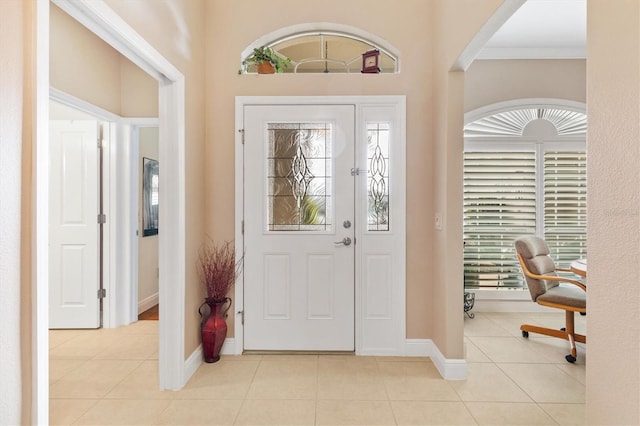 tiled entrance foyer with a wealth of natural light