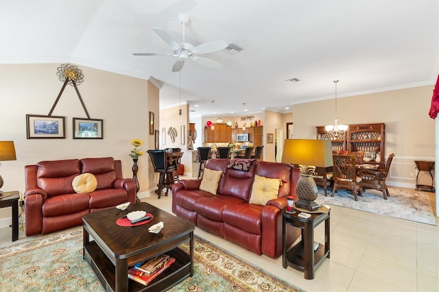 living room with light tile patterned floors, ceiling fan with notable chandelier, and ornamental molding