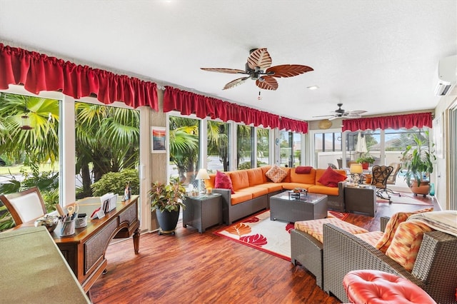 sunroom / solarium with ceiling fan and a wall mounted AC