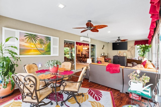 living room featuring a wall mounted air conditioner, ceiling fan, dark hardwood / wood-style floors, and a wealth of natural light