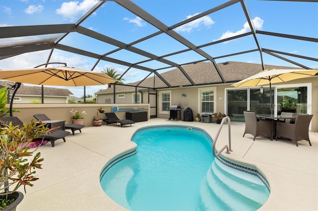 view of pool featuring a lanai and a patio area