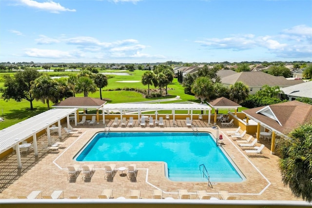 view of swimming pool featuring a patio