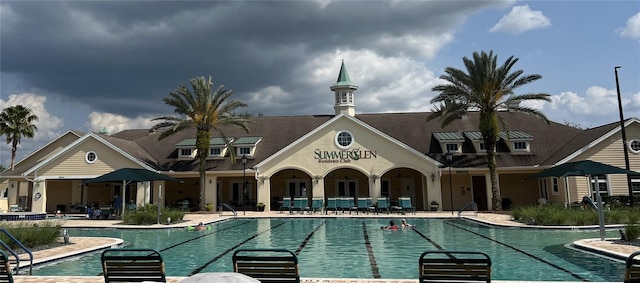 pool with a patio area