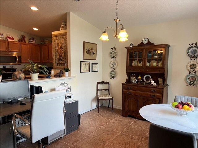 tiled dining space with a chandelier, recessed lighting, lofted ceiling, and baseboards