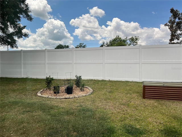 view of yard with fence