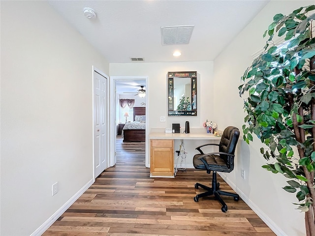 office space featuring ceiling fan and hardwood / wood-style flooring