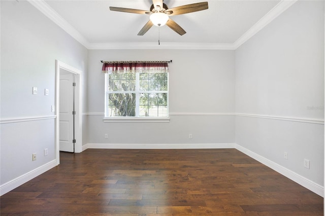 empty room featuring baseboards, ornamental molding, ceiling fan, and wood finished floors