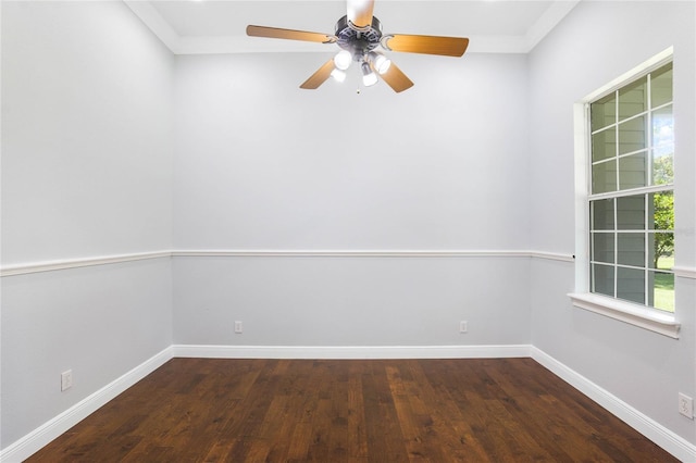 spare room featuring ornamental molding, a ceiling fan, baseboards, and wood finished floors