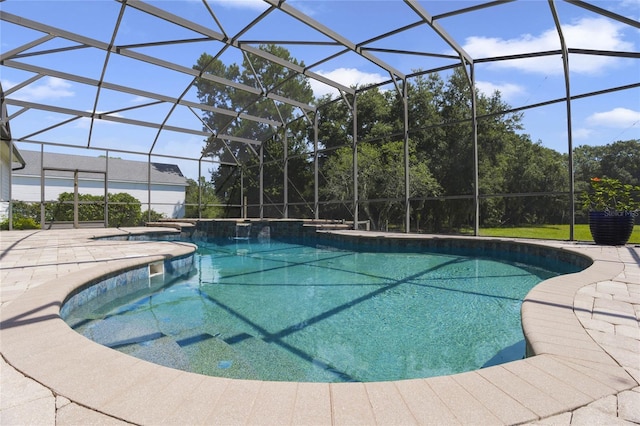 pool featuring a lanai and a patio