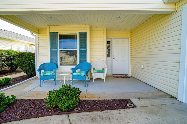 view of patio featuring a porch