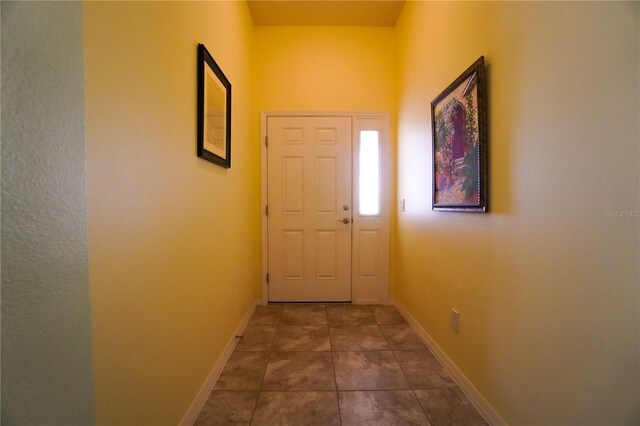 doorway featuring tile patterned floors