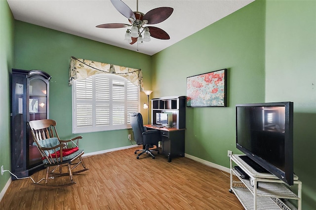 office area with ceiling fan and hardwood / wood-style floors