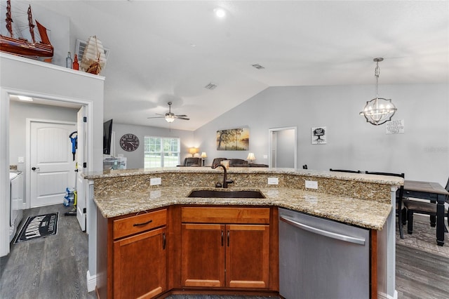 kitchen featuring ceiling fan with notable chandelier, dishwasher, dark hardwood / wood-style flooring, sink, and lofted ceiling