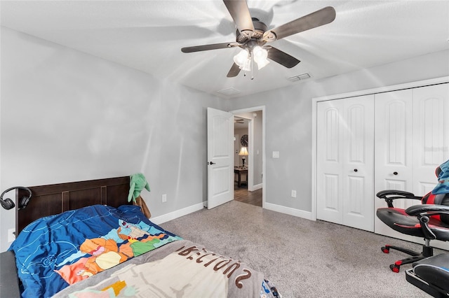 bedroom featuring ceiling fan and a closet