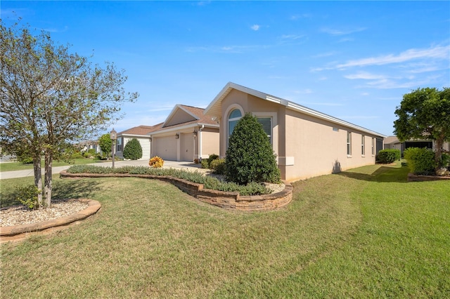 view of property exterior with a garage and a lawn