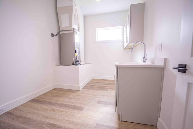 bathroom featuring hardwood / wood-style floors and sink