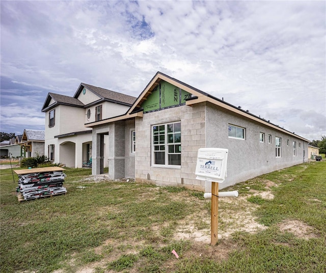 exterior space with a front yard