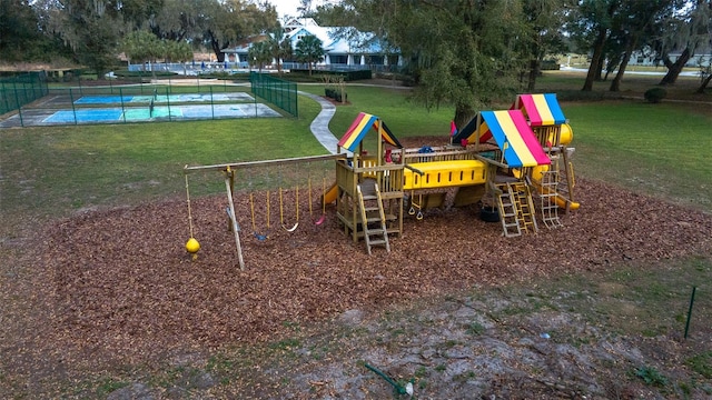 view of community featuring a yard and a playground