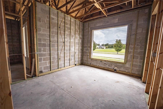 misc room with concrete flooring