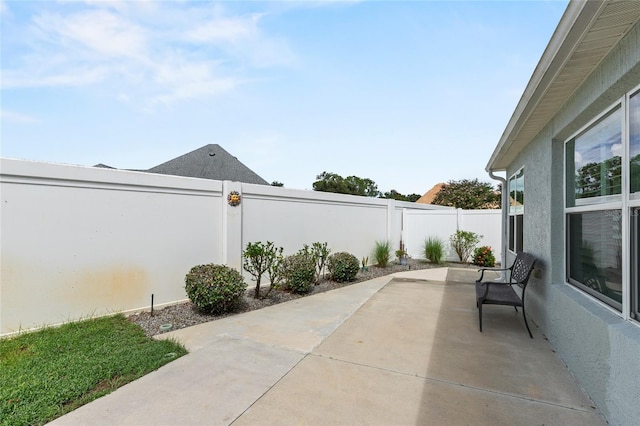view of patio with a fenced backyard