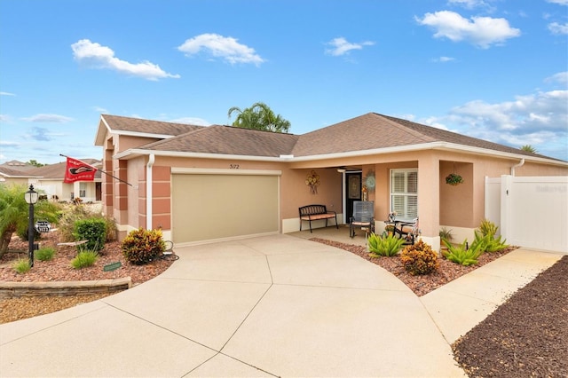 view of front of property featuring a garage