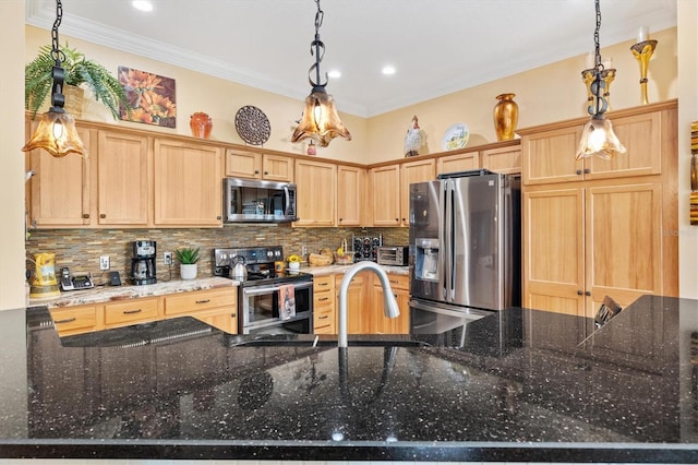 kitchen featuring pendant lighting, stainless steel appliances, and light brown cabinetry