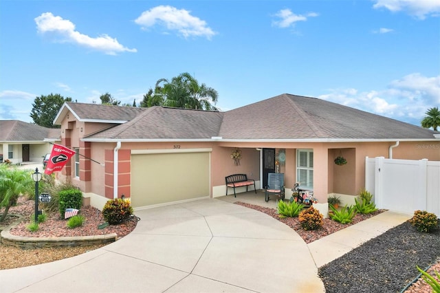 ranch-style home with a garage