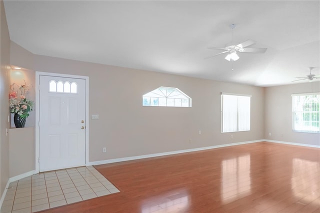 foyer entrance featuring ceiling fan and light hardwood / wood-style floors