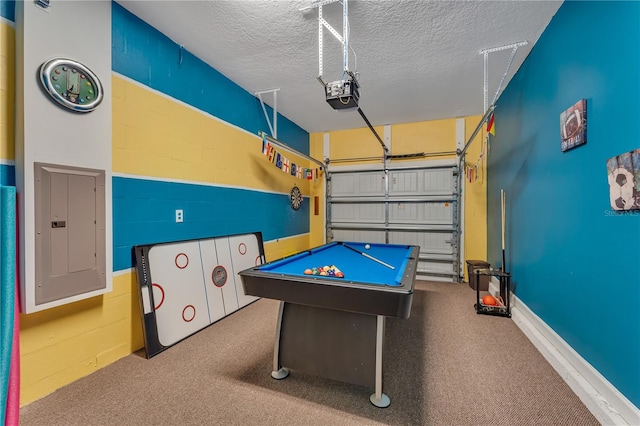 playroom featuring a textured ceiling, billiards, and electric panel