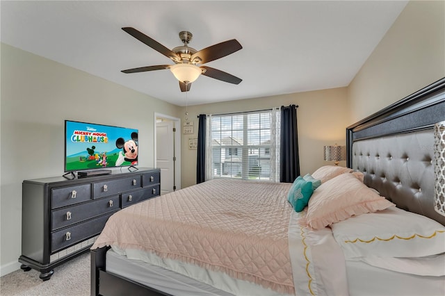 bedroom featuring ceiling fan and light colored carpet