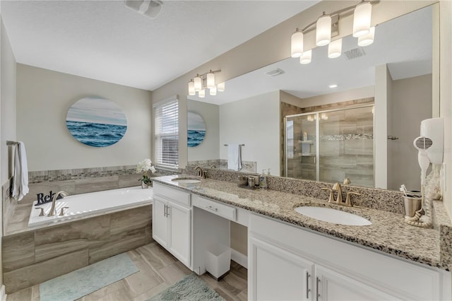 bathroom with vanity, hardwood / wood-style flooring, and shower with separate bathtub