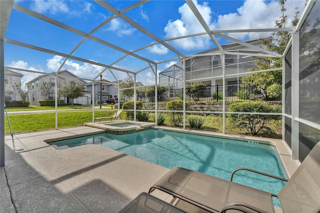 view of pool featuring a lanai and an in ground hot tub