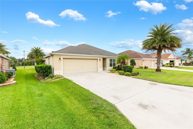 ranch-style home with a front lawn, a garage, and central AC