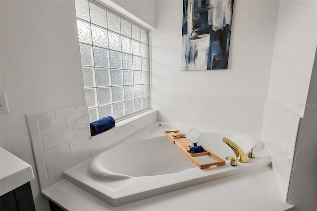 bathroom featuring a bathtub and vanity