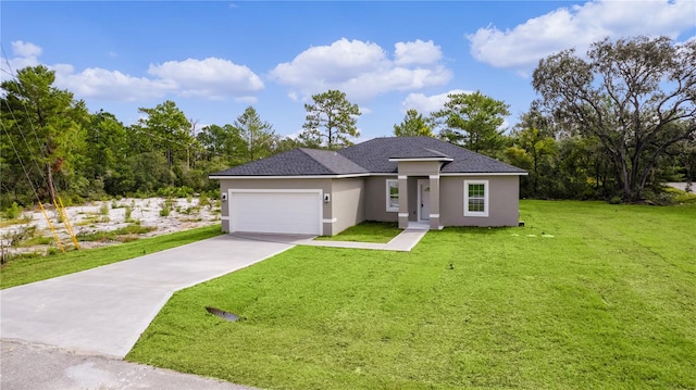 view of front facade with a garage and a front yard