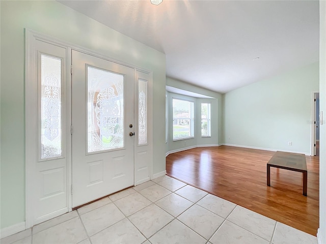 foyer entrance featuring light hardwood / wood-style floors