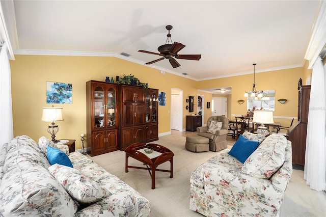 carpeted living room with ceiling fan with notable chandelier, lofted ceiling, and ornamental molding