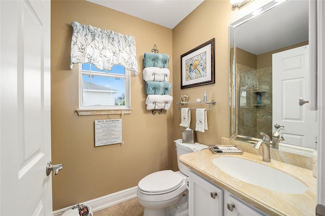 bathroom with walk in shower, vanity, and toilet