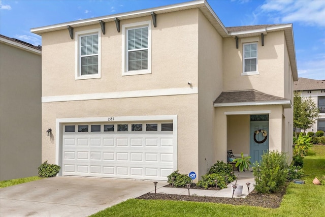 view of front of property featuring a garage