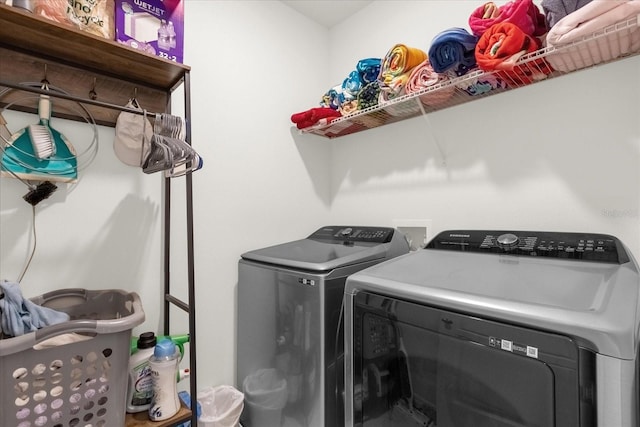 washroom with washer and clothes dryer