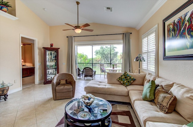 tiled living room featuring lofted ceiling, plenty of natural light, and ceiling fan