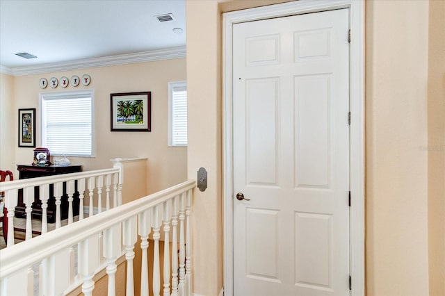 hallway with crown molding