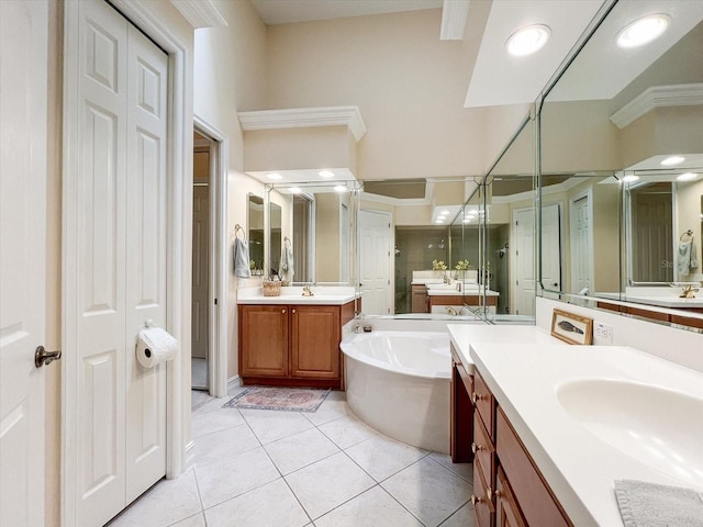 bathroom with crown molding, vanity, independent shower and bath, and tile patterned floors