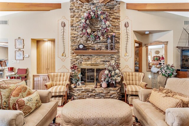 living room featuring a fireplace and vaulted ceiling with beams