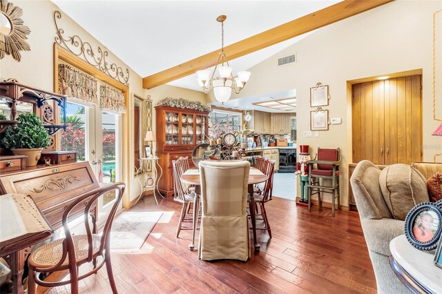 dining room featuring lofted ceiling with beams, beverage cooler, a notable chandelier, and dark hardwood / wood-style floors